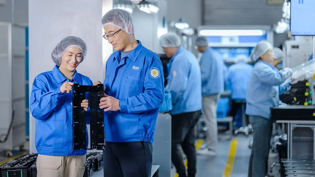 Two Rosti Staff checking quality in Assembly department