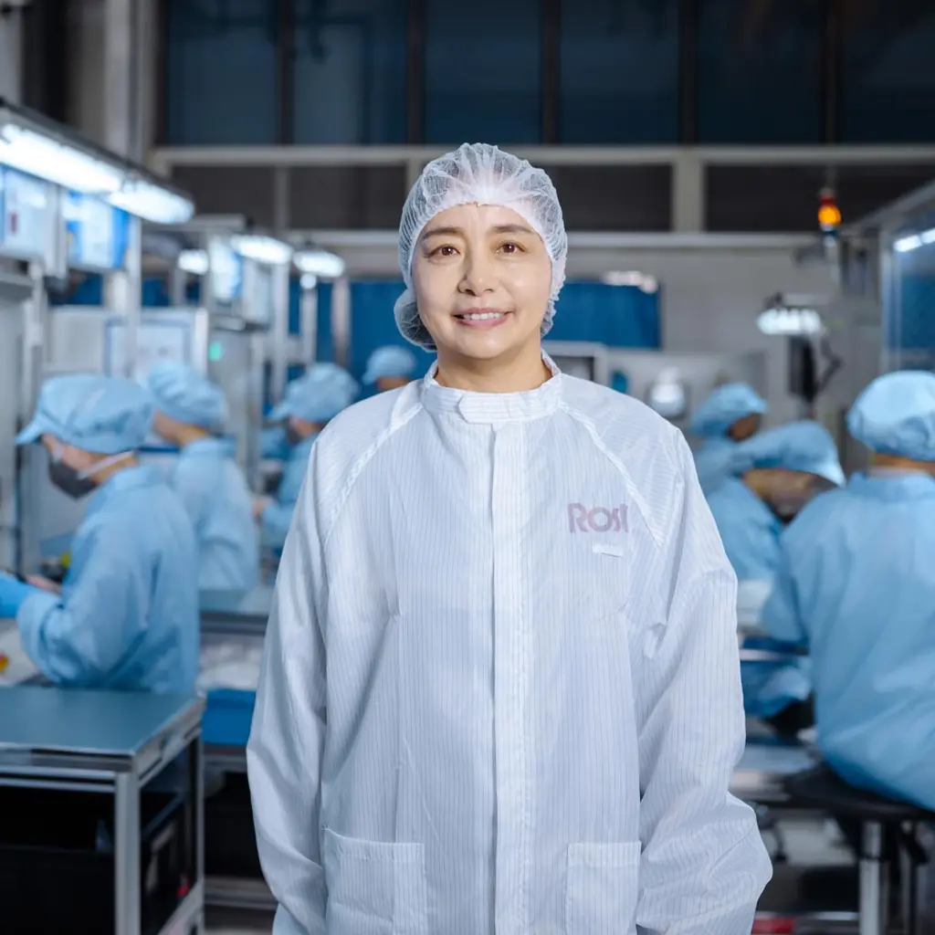 A female manager in the assembly hall at Rosti China