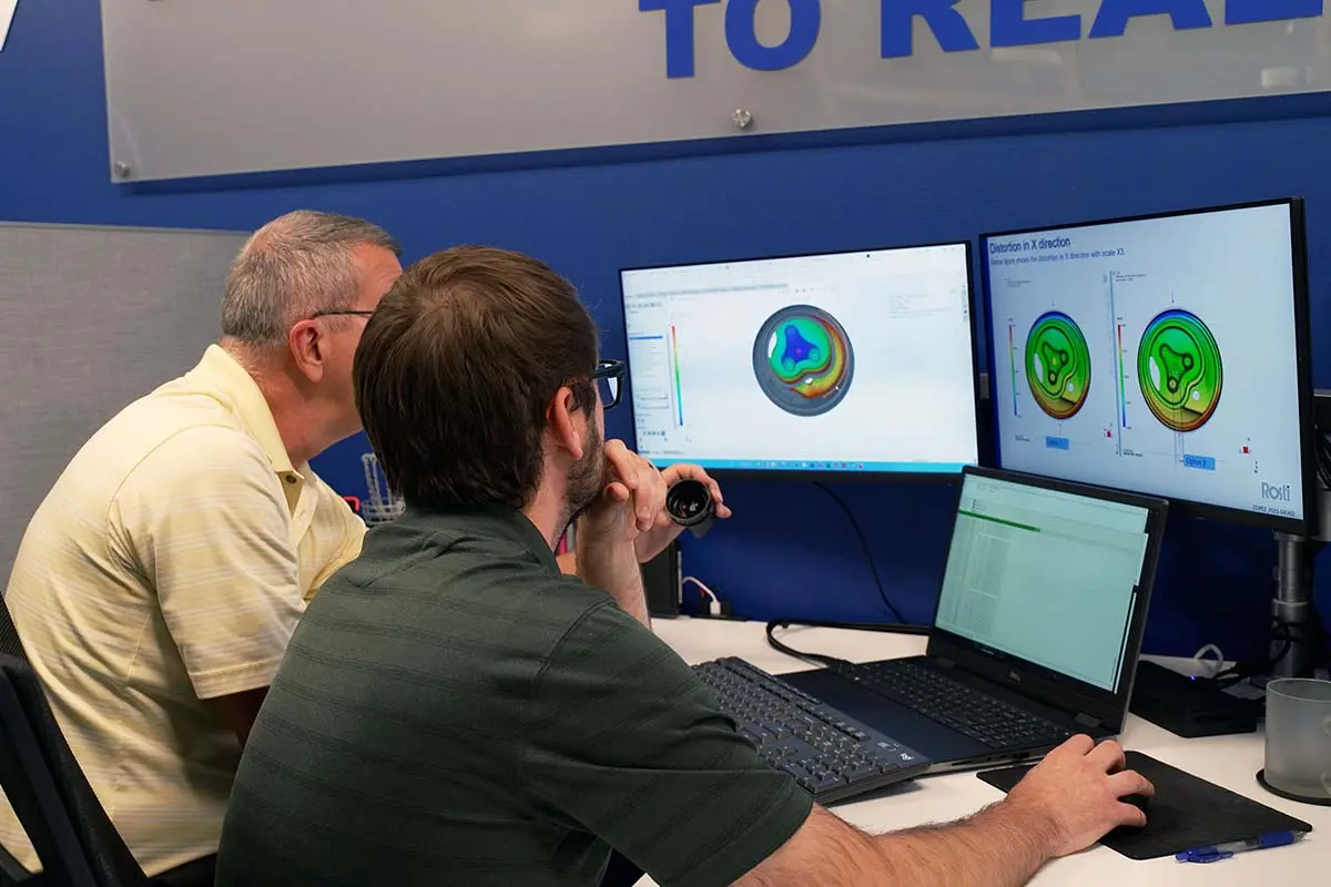 Two Engineers planning and simulate "K moulding