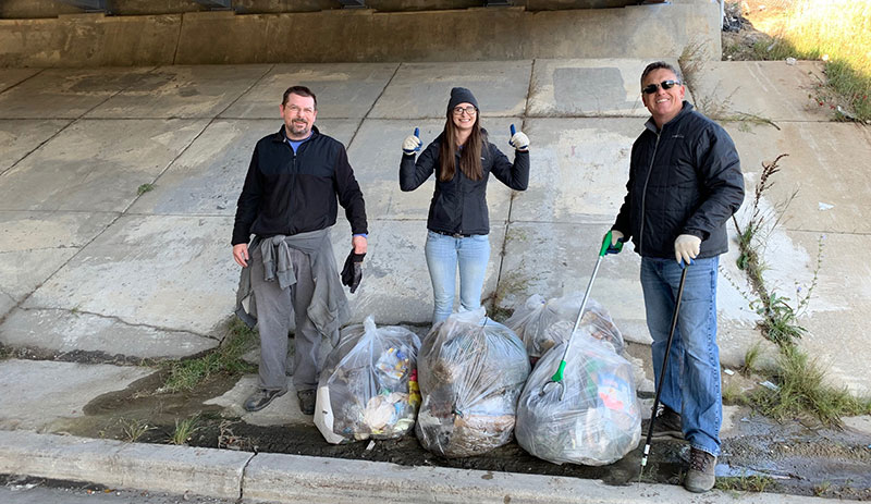 Rosti staff clearing rubbish