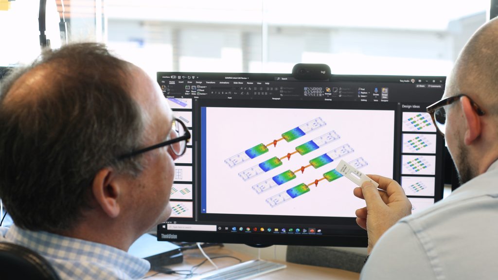 Two engineers designing