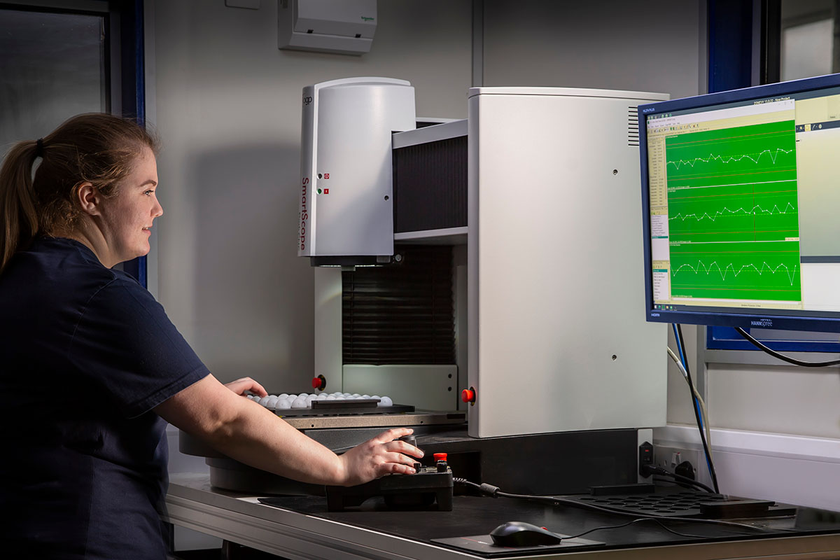 UK Rosti staff at computor 