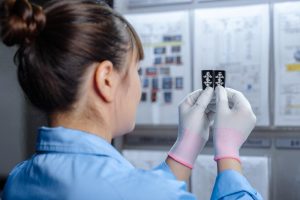A female staff checking quality.